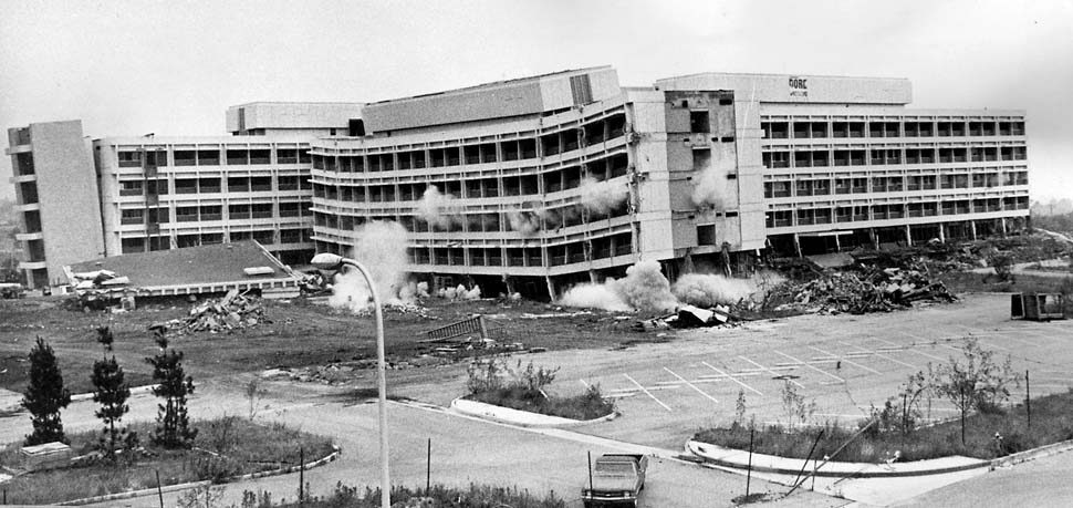 Historical photo of two wings of Olive View Hospital under demolition due to severe earthquake damage